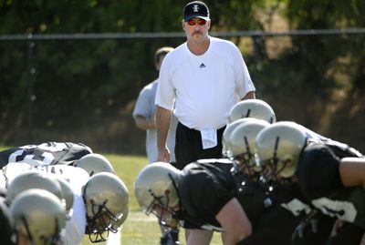 UI coach Robb Akey is looking for reliable offensive linemen.  (File / The Spokesman-Review)