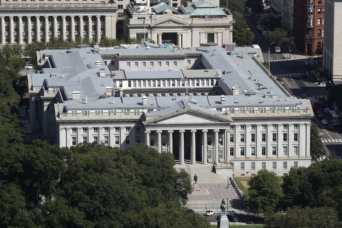 FILE - The U.S. Treasury Department building viewed from the Washington Monument, Wednesday, Sept. 18, 2019, in Washington. Hackers got into computers at the U.S. Treasury Department and possibly other federal agencies, touching off a government response involving the National Security Council. Security Council spokesperson John Ullyot said Sunday, Dec. 13, 2020 that the government is aware of reports about the hacks.  (Patrick Semansky)