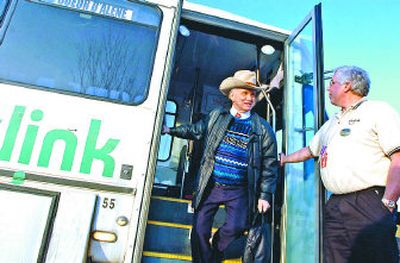 
Driver Lonnie O'Bannan, right, greets Duane Anderson as he gets off the Citylink bus at the Riverstone bus stop on Friday. The Coeur d'Alene Tribe spends much of its gas tax money on the Citylink system, a free bus service. 
 (Jesse Tinsley / The Spokesman-Review)