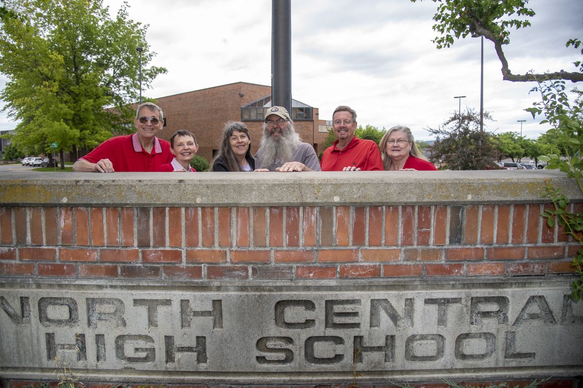 Jim and Alanna (Borgen) Crouch, left, Tina (Tintor) and Sam Saxton, and Dave and Barbara (Reel) Korbet Snyder all met in their high school years at North Central High School in Spokane. They are coming up on the celebration of their 50th reunion a year late because of COVID-19 delays.  (Jesse Tinsley/The Spokesman-Review)