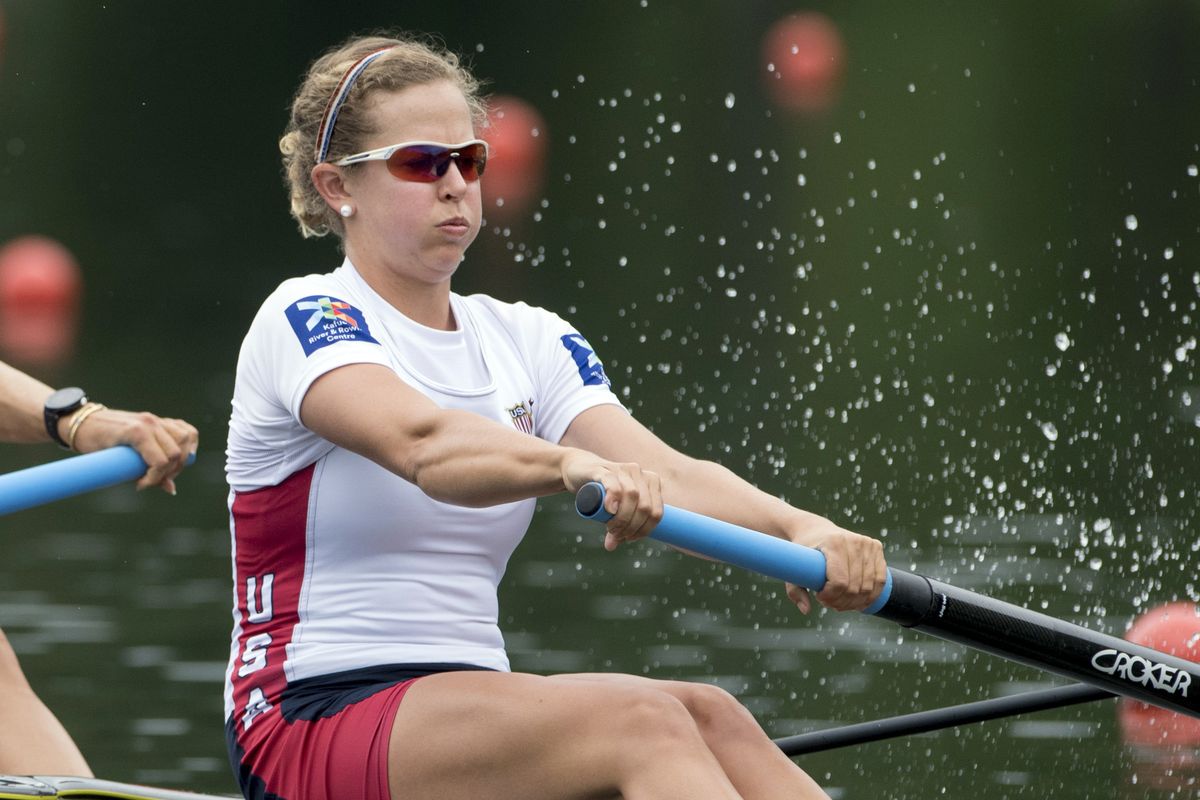 In this May 2016 photo, Grace Luczak of the United States, competes at the Women’s Pair Final race at the Rowing World Cup on Lake Rotsee in Lucerne, Switzerland. With four more spots for U.S. women in rowing at the Tokyo Games, Luczak quit her job and made the U.S. team. The International Olympic Committee said women’s participation in the Tokyo Games will be 49%, up from 45% in Rio, and a nearly even split with men.  (Associated Press)