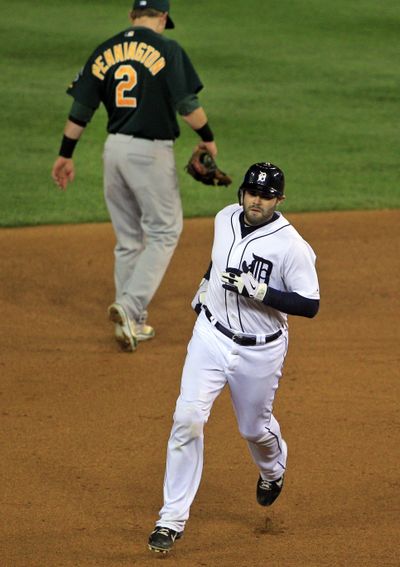 Detroit’s Alex Avila rounds second base after hitting a solo homer in Game 1 win. (Associated Press)