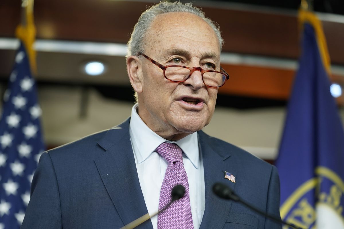 Senate Majority Leader Chuck Schumer of New York, listens to a reporter during a press conference about gas prices, Thursday, April 28, 2022, on Capitol Hill in Washington. (Mariam Zuhaib)
