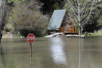 
Wolf Lodge campground near Coeur d'Alene, shown here Friday, has been flooded by water from a quick snowmelt. 
 (Brian Plonka / The Spokesman-Review)