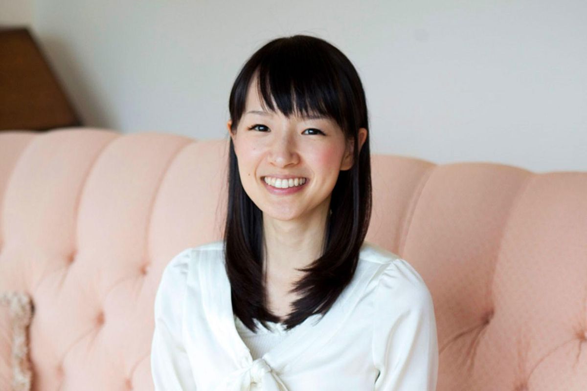 This image released by Ten Speed Press shows Marie Kondo, author of the international best-seller, "The Life-Changing Magic of Tidying Up," and her latest book, "Spark Joy: an Illustrated Master Class on the Art of Organizing and Tidying Up." (Natsuno Ichigo / AP)