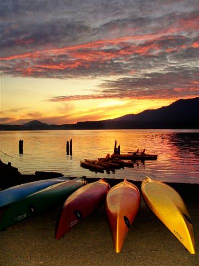 Sunset over Lake Quinault and the boating beach at Quinault Lodge.