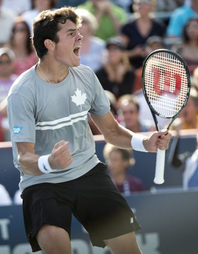 Canada’s Milos Raonic celebrates his Rogers Cup victory Saturday. (Associated Press)