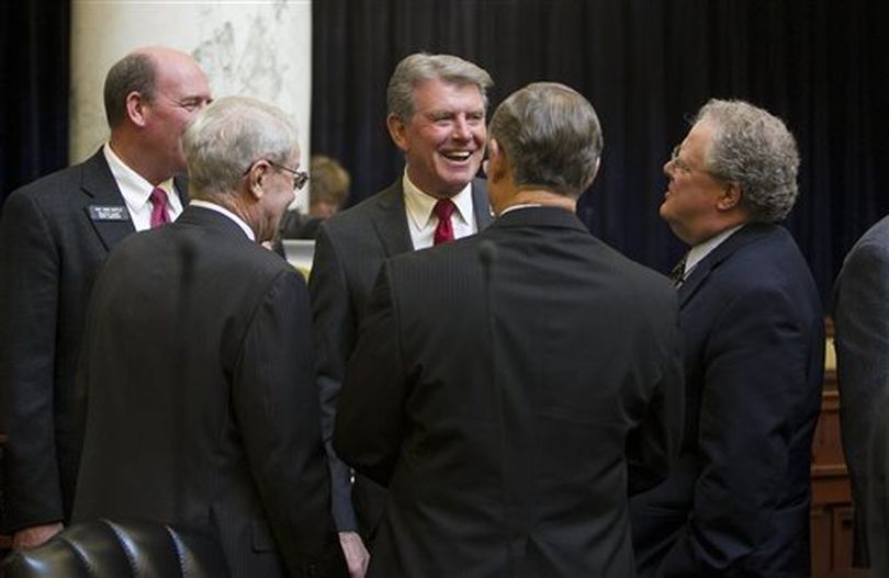 Gov. Butch Otter finds his way to the second floor of the Statehouse to congratulate members of the Idaho House as they finish the 2013 session Thursday April 4, 2013 in Boise. (AP/Idaho Statesman / Darin Oswald)