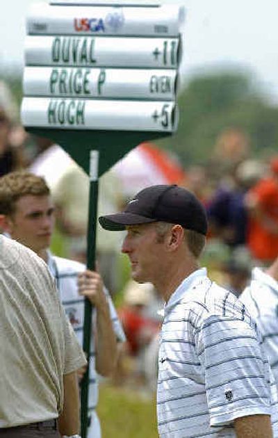 David Duval walks off the course after a double bogey on No. 18. Duval shot 13-over par in the first round.
(Associated Press / The Spokesman-Review)