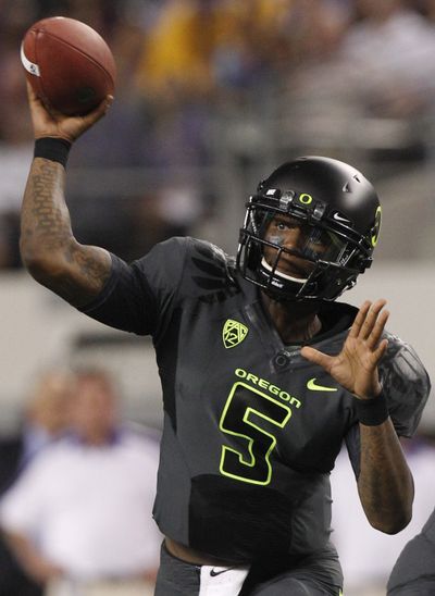 The status of Oregon quarterback Darron Thomas for Saturday's game against WSU is still unknown. (Associated Press)