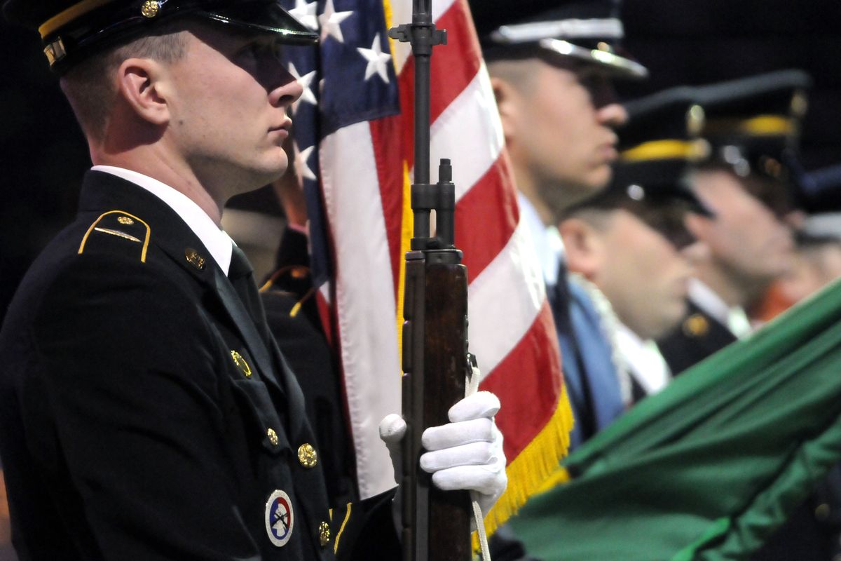 The honor guard stands at attention during the Pledge of Allegiance at the Veterans Day observance at the Spokane Arena on Wednesday, Nov. 11, 2009. (Jesse Tinsley / The Spokesman-Review)