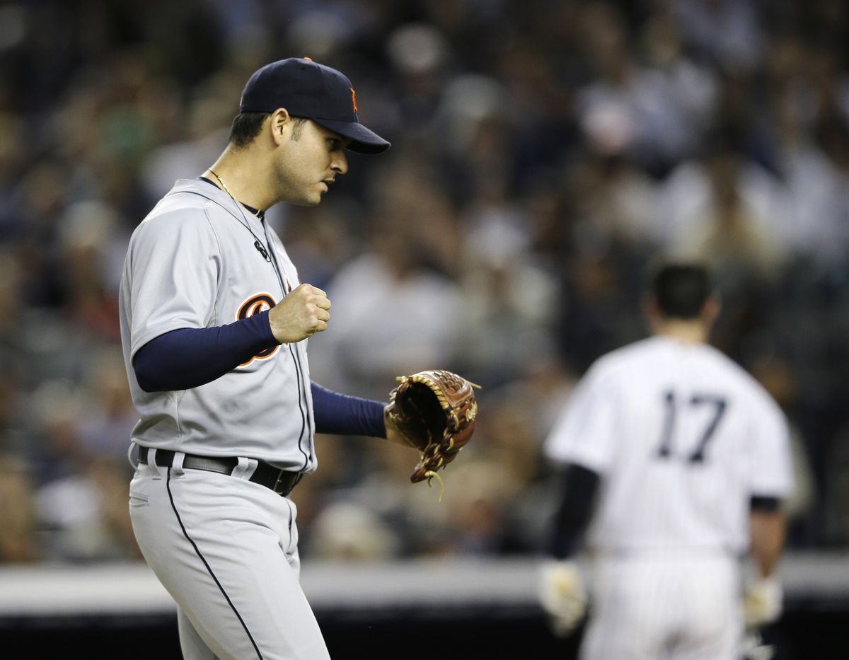 Tigers’ Anibal Sanchez reacts after striking out Yankees’ Jayson Nix (17) to end the seventh. (Associated Press)