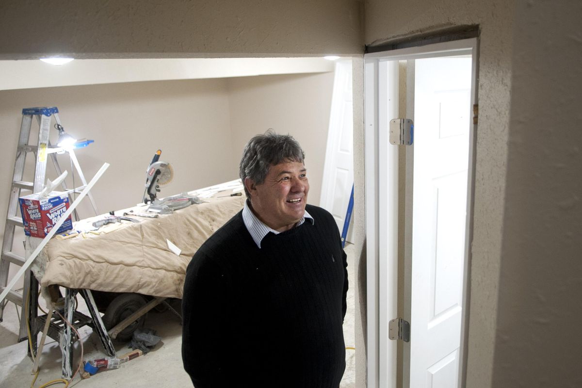 Alexander Scott talks about the nuisance property that he purchased and is in the process of remodeling in Spokane Valley on Thursday, Jan. 24, 2019. Spokane Valley passed an ordinance last year taking aim at nuisance properties. The home is on East 10th Avenue and was a neighborhood problem for years. (Kathy Plonka / The Spokesman-Review)