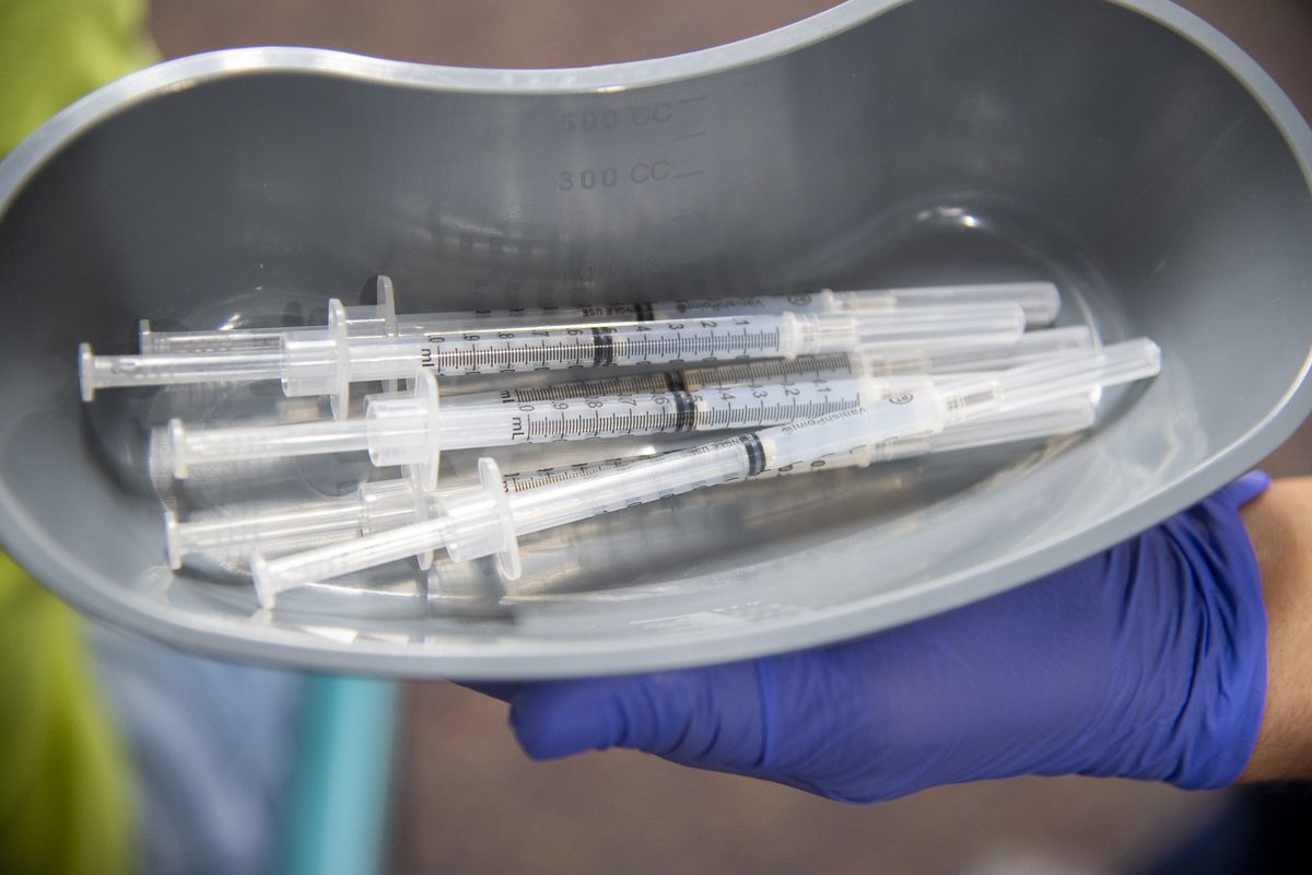 Pre-filled with measured out doses of the Moderna vaccine, Friday, Jan. 22, 2021, at a pop-up clinic at Holy Family Hospital in north Spokane.   (Jesse Tinsley/The Spokesman-Review)