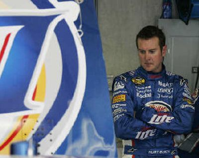 
Kurt Busch admires his car on a day when he had the fastest lap. 
 (Associated Press / The Spokesman-Review)