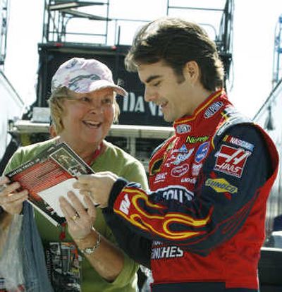 
Jeff Gordon, shown signing an autograph for a fan, has had a superior year both on and off the track.Associated Press
 (Associated Press / The Spokesman-Review)