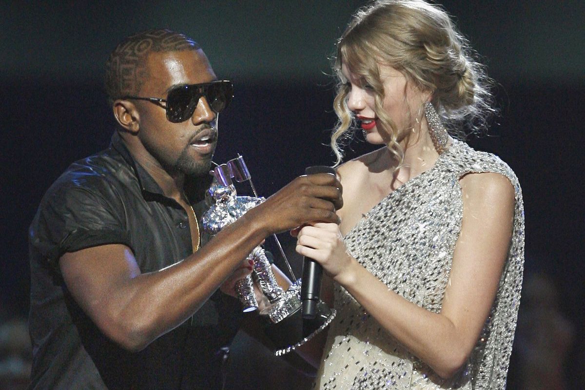 In this Sept. 13 file photo, Kanye West takes the microphone from Taylor Swift as she accepts the “Best Female Video” award during the MTV Video Music Awards.Associated Press file photos (Associated Press file photos / The Spokesman-Review)