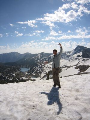 Jeff Lambert of the Spokane Mountaineers poses in the last weekend of July 2011 along with Mirror Lake and Eagle Cap Peak from Carper Pass -- all popular backpacking destinations in the Eagle Cap Wilderness. (Jeff Lambert)