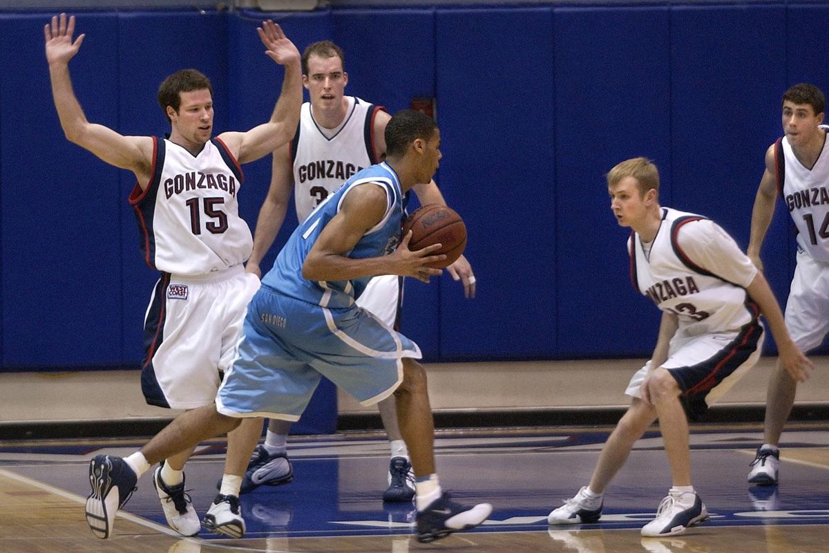 Gonzaga’s defense from left Colin Floyd, Richard Fox, Stephen Gentry and Brian Michaelson make life tough for Michael Hubbard of San Diego in 2004 game. (Dan Pelle / The Spokesman-Review)