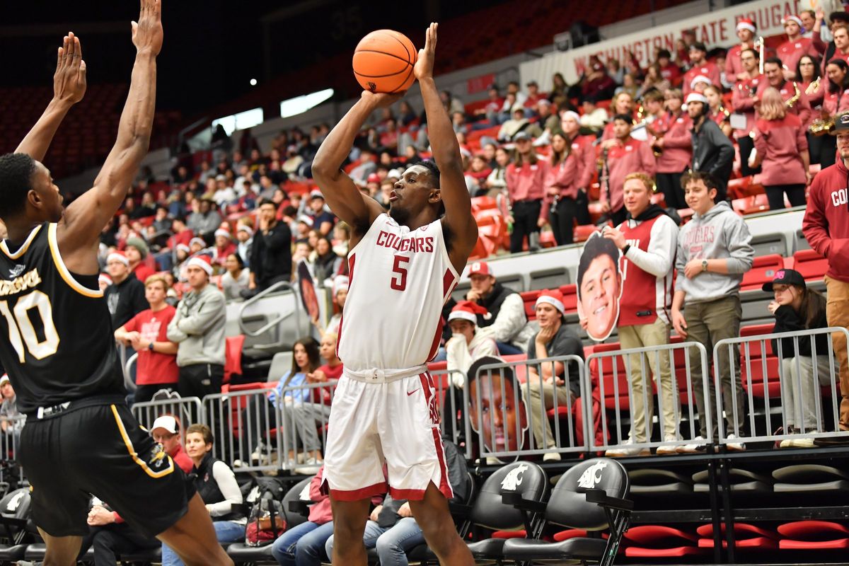 Washington State guard TJ Bamba shoots a 3-pointer during a nonconference game against Northern Kentucky on Wednesday at Beasley Coliseum. Bamba scored a game-high 22 points in the Cougars’ blowout win.  (WSU Athletics)