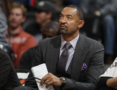 In this Nov. 30, 2016 photo, Miami Heat assistant coach Juwan Howard watches during the second half of the team‘s NBA basketball game against the Denver Nuggets in Denver. (David Zalubowski / Associated Press)