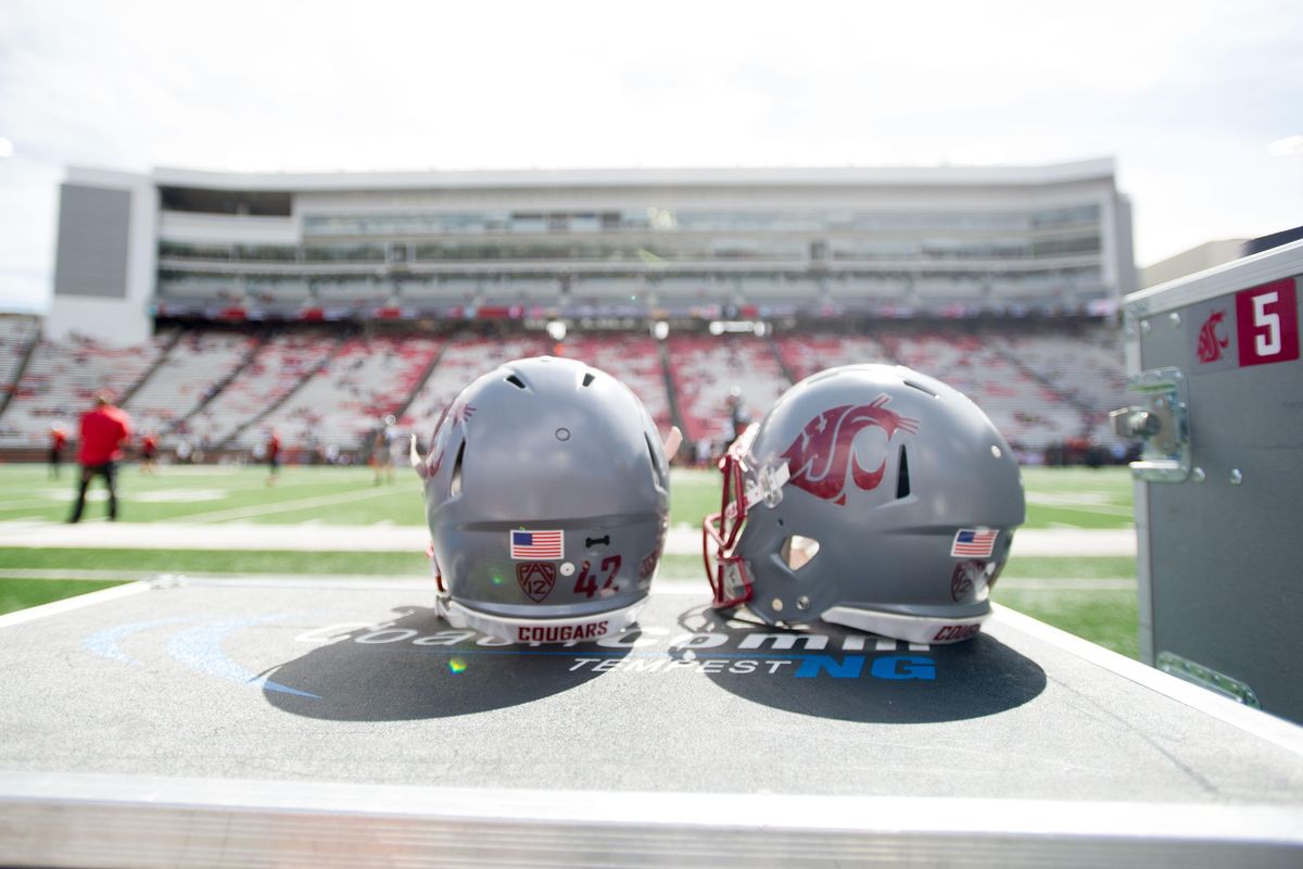 WSU helmets are seen with a Freeman High School bone sticker before the start of the first half of a Pac-12 football game on Saturday, September 16, 2017, at Martin Stadium in Pullman. (Tyler Tjomsland / The Spokesman-Review)