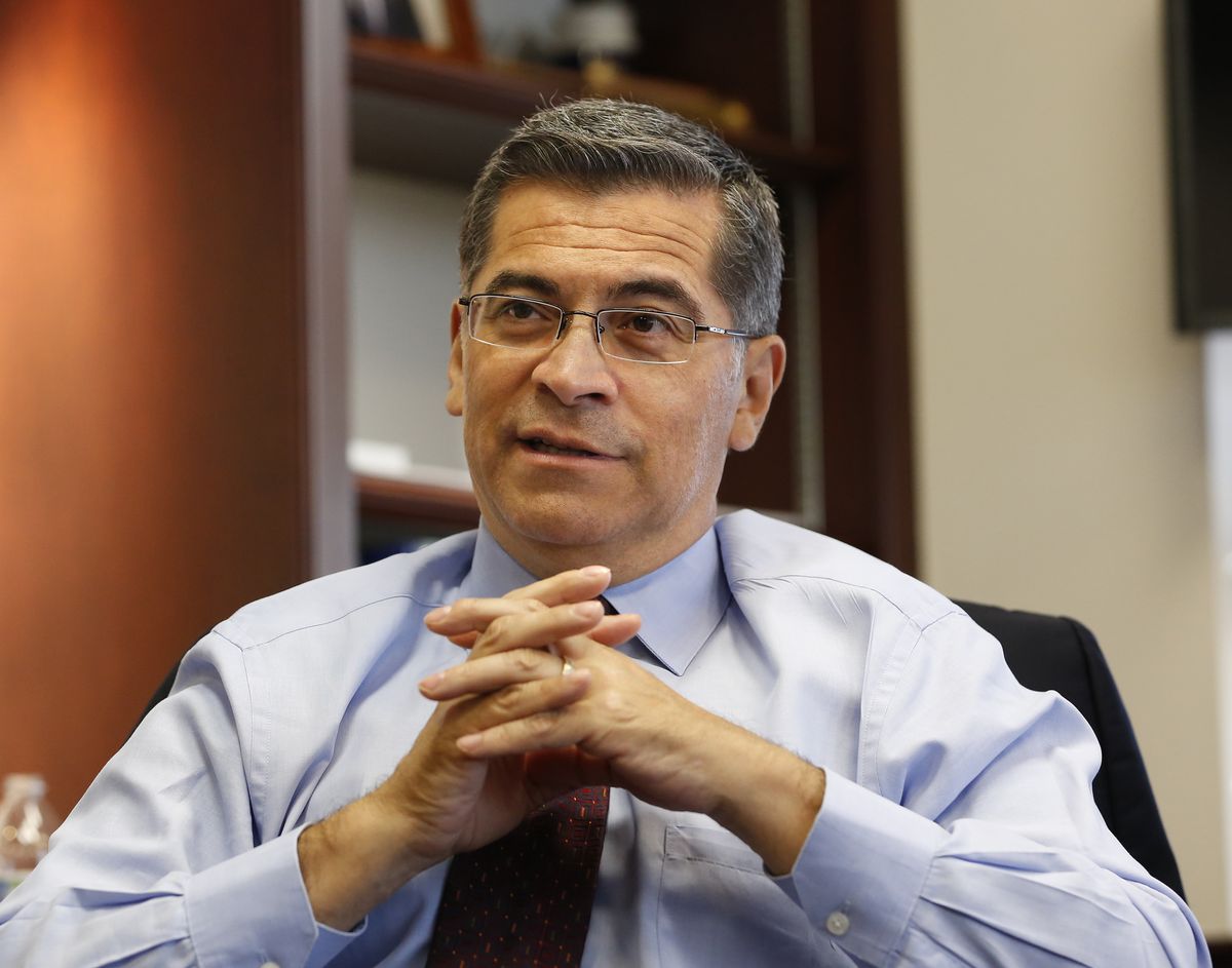 FILE - In this Oct. 10, 2018, file photo, California Attorney General Xavier Becerra discusses various issues during an interview with The Associated Press, in Sacramento, Calif. President-elect Joe Biden has picked Becerra to be his health secretary, putting a defender of the Affordable Care Act in a leading role to oversee his administration’s coronavirus response.  (Rich Pedroncelli)