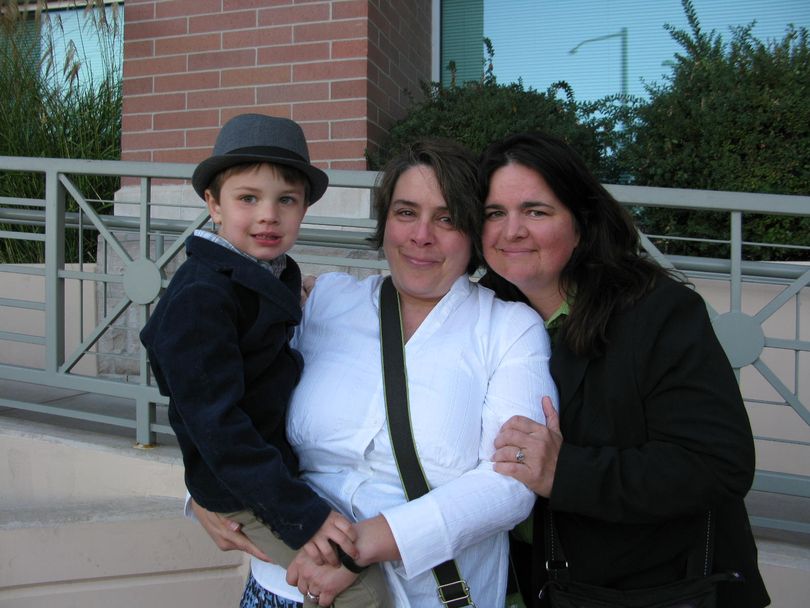 Shelia Robertson and Andrea Altmayer with son Bridger, 4, outside the Ada County Courthouse on Wednesday morning, after being turned away for a marriage license (Betsy Russell)