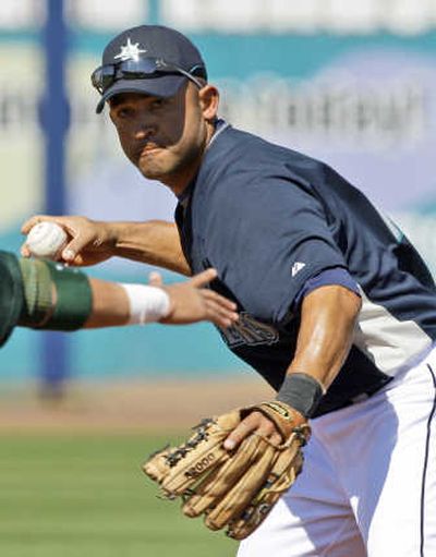 
Associated Press Miguel Cairo adds a versatile infielder to the M's roster in addition to Willie Bloomquist.
 (Associated Press / The Spokesman-Review)