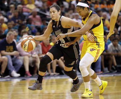 In this July 12, 2017, file photo, San Antonio Stars’ Kelsey Plum, left, goes toward the basket against Indiana Fever’s Briann January during the first half of a WNBA basketball game in Indianapolis. Plum has been playing a lot better lately and so have the Stars. (Darron Cummings / Associated Press)