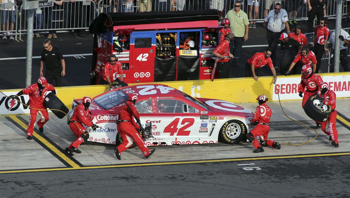 Crew members perform a pit stop on Kyle Larson’s car during qualifying for Saturday’s NASCAR Cup series All-Star auto race at Charlotte Motor Speedway in Concord, N.C., Friday, May 19, 2017. Larson won the pole position for the race. (Bob Jordan / Associated Press)