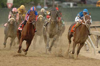 
Smarty Jones (7) with Stewart Ellioitt up, right, leads the field through the final turn on his way to winning the Preakness Stakes Saturday in Baltimore. Smarty Jones (7) with Stewart Ellioitt up, right, leads the field through the final turn on his way to winning the Preakness Stakes Saturday in Baltimore. 
 (Associated PressAssociated Press / The Spokesman-Review)