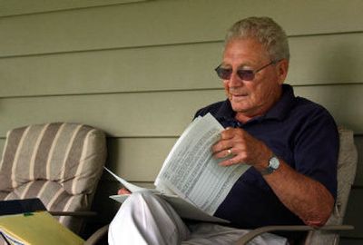 
Chuck Hafner reviews paperwork from past school bond issues on his back porch recently. Hafner will be a co-chair of the Central Valley bond commitee. 
 (Liz Kishimoto / The Spokesman-Review)