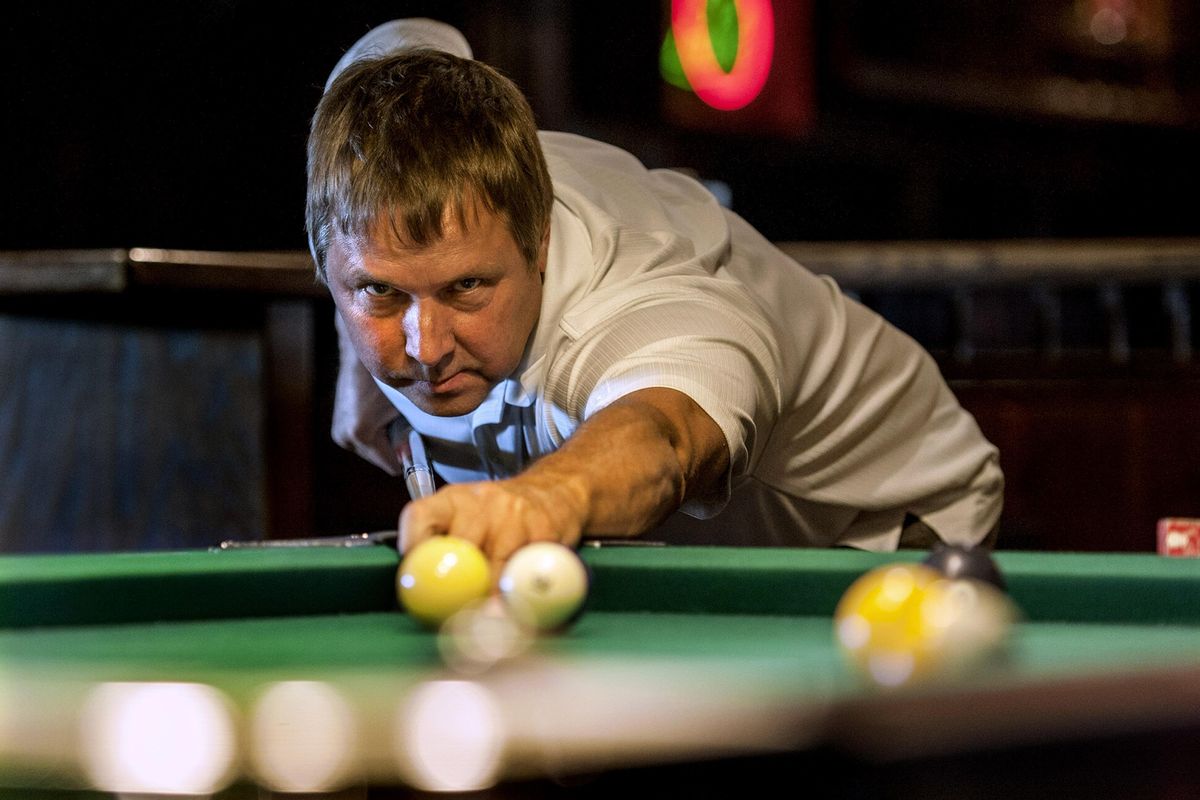 Bob Reimer eyes his next shot while playing pool at Annie Fannies Bar Grill & Casino in Spokane on Sunday, July 16, 2017. His team won the City Cup championship and will now travel to Las Vegas to compete. (Kathy Plonka / The Spokesman-Review)