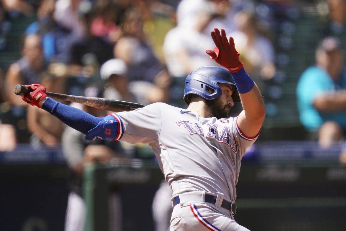 Texas Rangers' Joey Gallo strikes out swinging against the Seattle Mariners to end the sixth inning of a baseball game Sunday, July 4, 2021, in Seattle.  (Elaine Thompson)