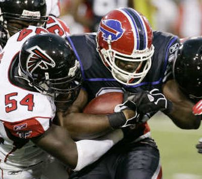 
Kevin Everett, here in action during the preseason, is recovering from a spinal injury. Associated Press
 (Associated Press / The Spokesman-Review)