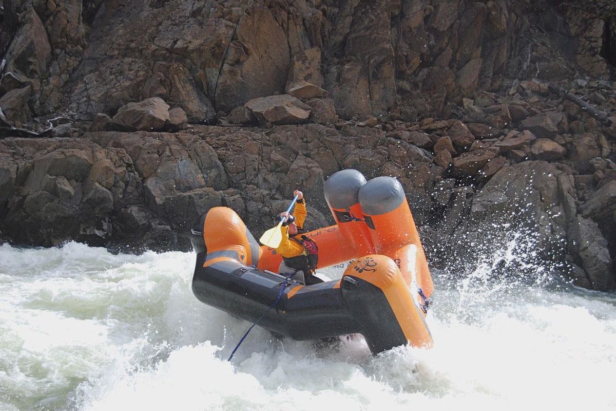 Boaters paddle a Creature Craft on a wild ride down the North Fork of the Smith River in northwest California. The raft design prevents the raft from turning bottoms up. (GEORGE NUCKOLS / Courtesy of George Nuckols)