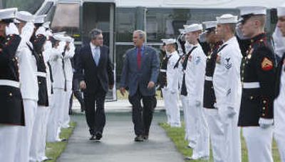 
President Bush welcomes British Prime Minister Gordon Brown to the presidential retreat at Camp David, Md., on Sunday.Associated Press
 (Associated Press / The Spokesman-Review)