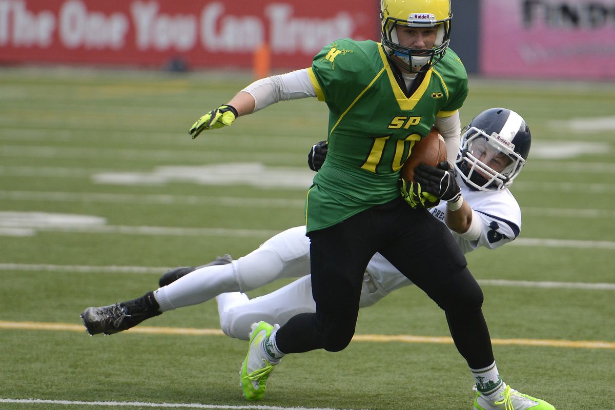 Shadle Park wide receiver Tanner Pauly (10) is tackled from behind by Gonzaga Prep linebacker Willie Graham during the first half of their GSL high school football game, Friday, Sept. 27, 2013, at Joe Albi Stadium. (Colin Mulvany / The Spokesman-Review)