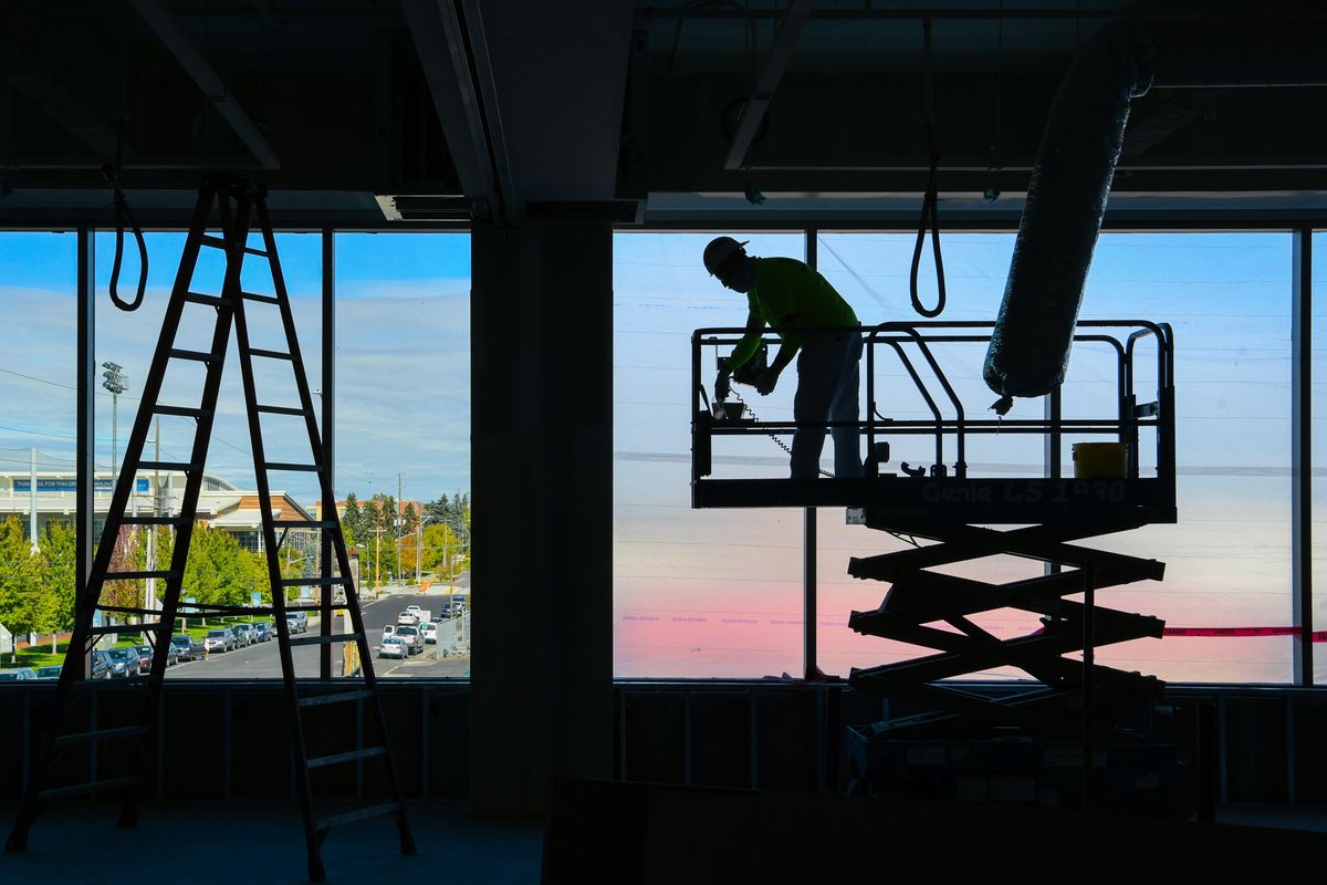 Crews work on a classroom Thursday in Spokane at the new hub for medical and health education, research, and innovation anchored by the UW School of Medicine-Gonzaga University Health Partnership.  (DAN PELLE/THE SPOKESMAN-REVIEW)