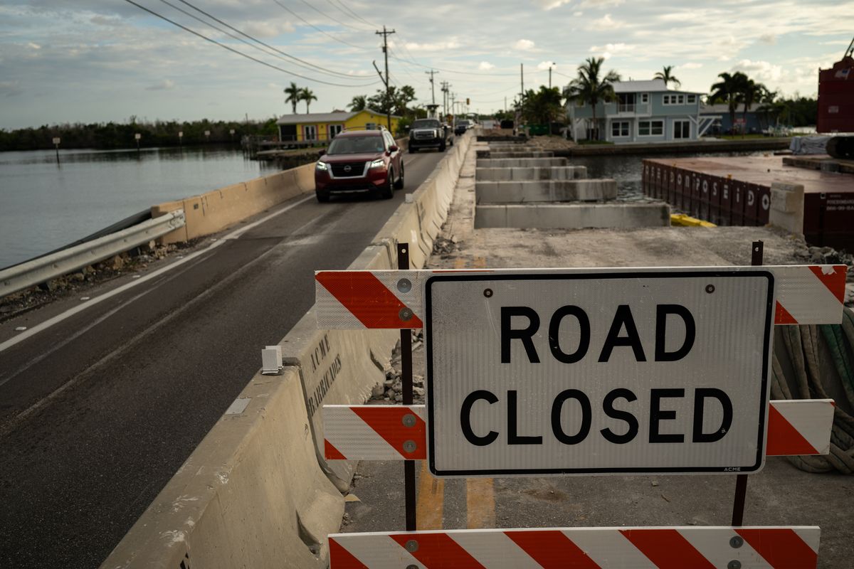 Reconstruction work on a Matlacha bridge destroyed in Hurricane Ian. It is the only roadway connecting Pine Island to the mainland. (MUST CREDIT: Thomas Simonetti for The Washington Post)  (Thomas Simonetti/For The Washington Post)