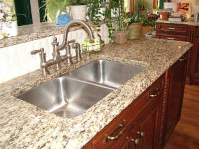 A granite top like this must be installed on kitchen cabinets that are level and sturdy.
(Tim Carter / The Spokesman-Review)