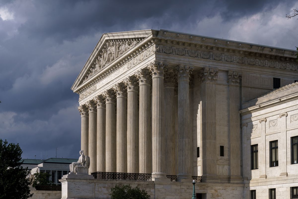 This June 8, 2021 photo shows the Supreme Court building in Washington. On Friday, Sept. 24, 2021, the Associated Press reported on stories circulating online incorrectly asserting that after a legal challenge from Robert F. Kennedy Jr. and a group of scientists, the U.S. Supreme Court ruled COVID-19 vaccines are unsafe and “canceled universal vaccination.” While ​​Kennedy said he has been a part of more than 30 lawsuits on the subject of vaccine safety, those are at different stages of the judicial process and none have appeared before the Supreme Court.  (J. Scott Applewhite)