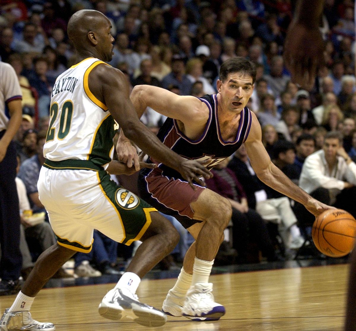 Utah's John Stockton drives past Seattle's Gary Payton during a 2002 exhibition game at the Spokane Arena.  (Liz Kishimoto/The Spokesman-Review)