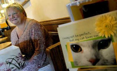 
Barbara Christofferson creates greeting cards that are offered at shops in Coeur d'Alene. She gives all of the profits to the local humane society.  
 (Kathy Plonka / The Spokesman-Review)