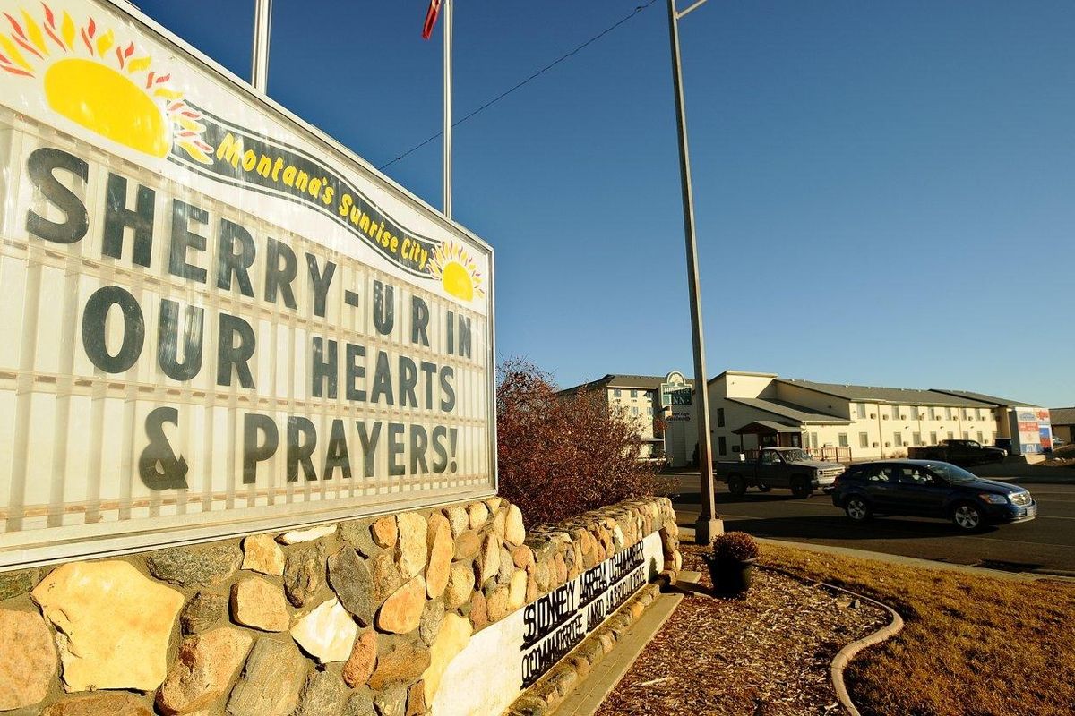 The Chamber of Commerce sign in Sidney, Mont., offers prayers for Sherry Arnold last week. (Associated Press)