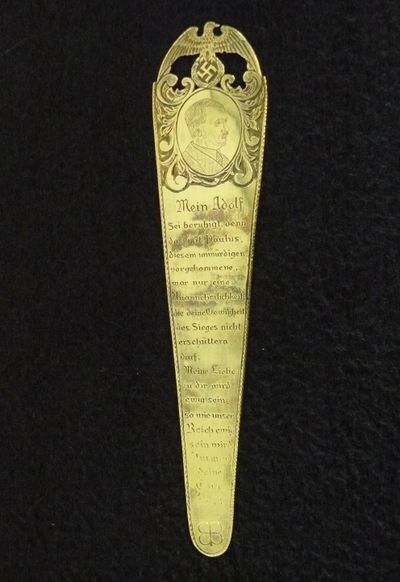 This photo, provided by Immigration and Customs Enforcement, shows an 18-karat  gold bookmark, alleged to belong to Adolf Hitler,  that was seized by ICE agents Tuesday in Bellevue.   (Associated Press / The Spokesman-Review)