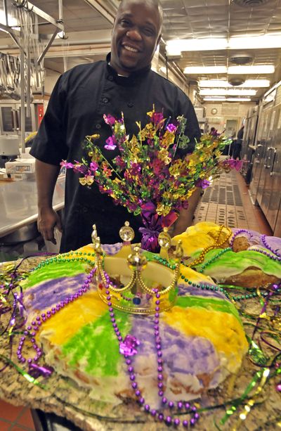 Chef Marcellus Kennedy of Deaconess Hospital shows off his King Cake creation that he makes annually in honor of Mardi Gras. (CHRISTOPHER ANDERSON)