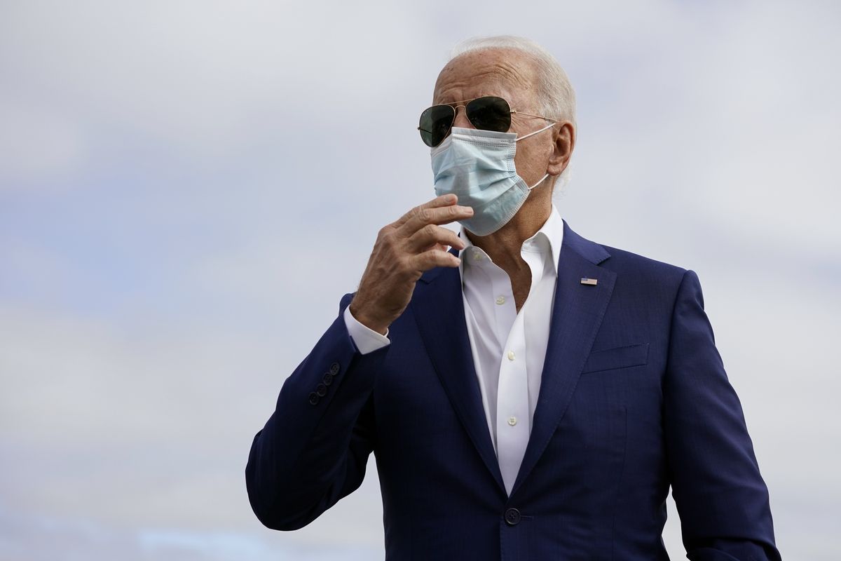 Democratic presidential candidate former Vice President Joe Biden speaks to members of the media before boardin his campaign plane at New Castle Airport, in New Castle, Del., Tuesday Oct. 13, 2020, en route to Florida. (Carolyn Kaster)