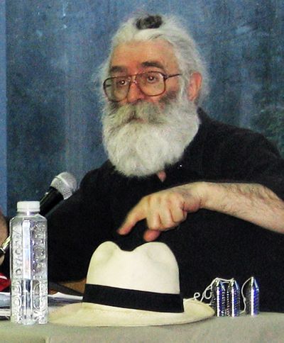 This undated photo  shows former Bosnian Serb leader Radovan Karadzic with glasses, long white hair and a beard.  (Associated Press / The Spokesman-Review)